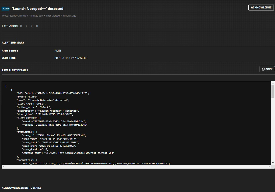 Screenshot of the AMSI alert details panel showing the alert summary and a raw JSON alert details view in a dark-themed UI.