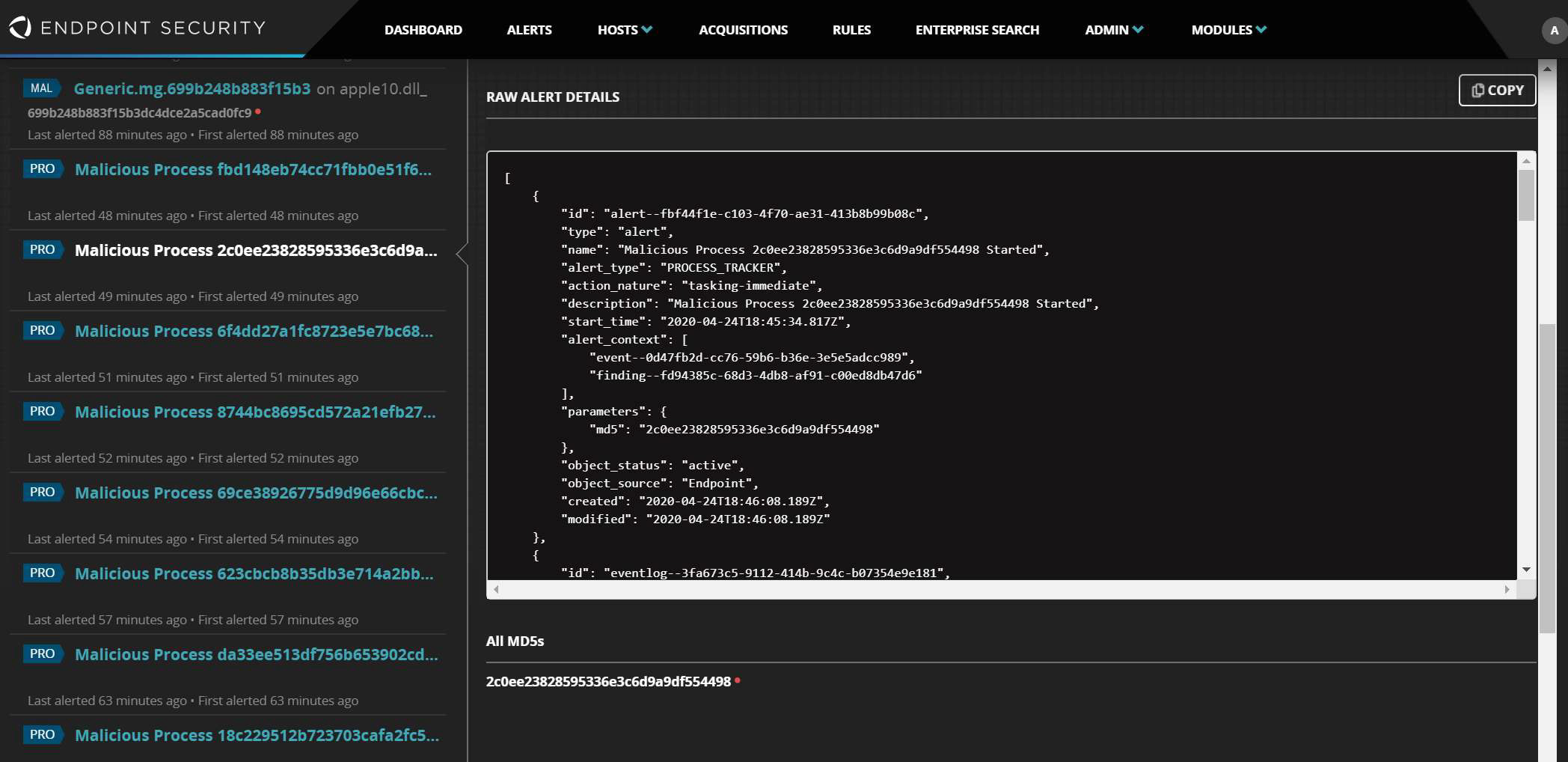 Screenshot of the Endpoint Security console showing a left column list of detected malicious processes and a right pane displaying raw JSON Raw Alert Details in a dark code viewer