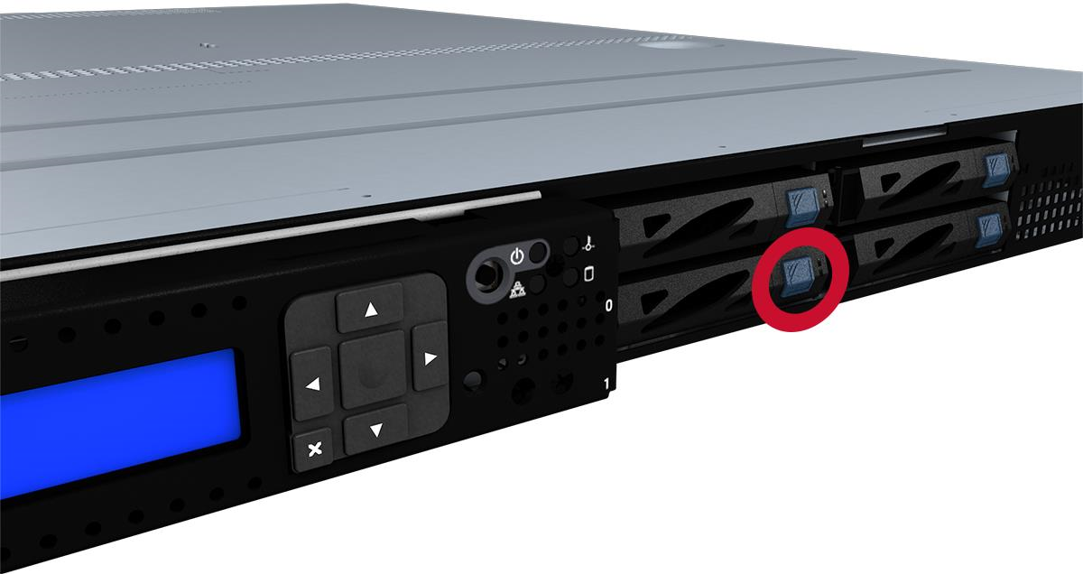 Close-up of the front drive area showing a navy blue rectangular release button circled in red near the drive carrier latch handle.