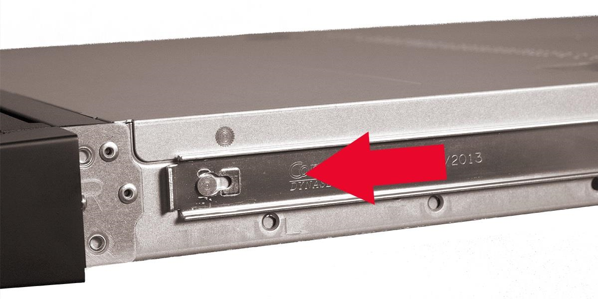 Close-up of the appliance outer rail with a large red arrow pointing to a peg on the right side, showing where the rail engages the peg.