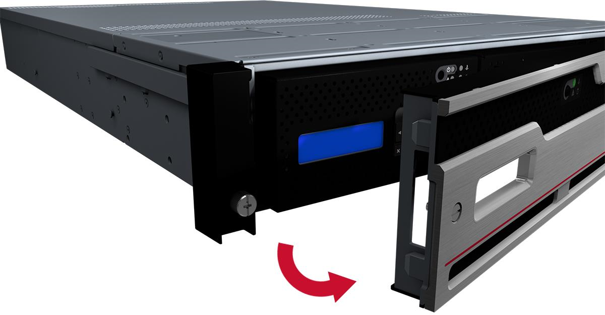 Server front bezel being pulled away from the appliance showing a black front panel with a blue display and a red curved arrow indicating the removal direction