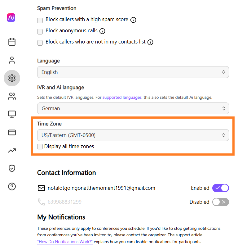 Settings for spam prevention, language, and time zone in a user interface.